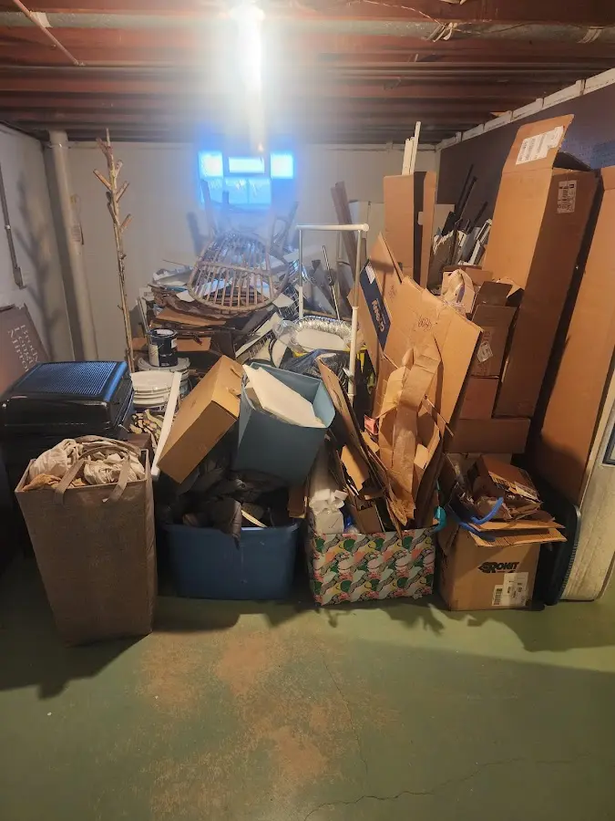 Roll-off dumpster container at job site for 6 Yard Dumpster Rental in Eagle Crest